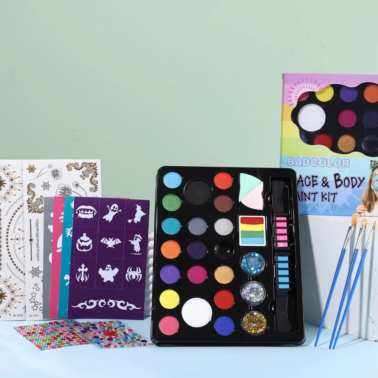 18 Colors Face Painting Kit for Kids - Water Based Pro Washable Kids Face Paint with Brushes, Glitters, Hair Chalks,Tatto Stickers,Sponges,Gems,Stencils for Halloween Party Cosplay